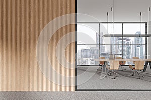 Modern office room interior with board and chairs, panoramic window. Empty wall