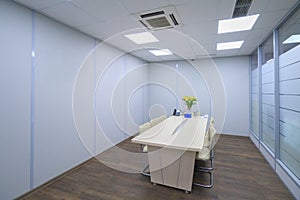 Modern office space lit by artificial light