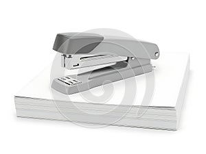 Modern office stapler on stack of paper