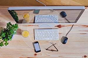 Modern office workplace, top view of computer