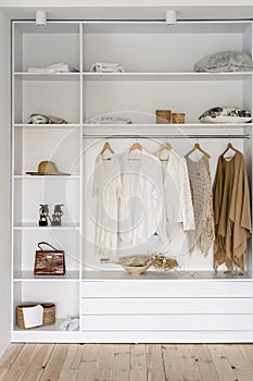 Modern and open garderobe in dressing room photo