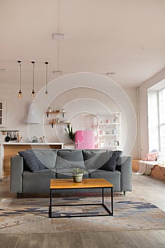 Modern open plan kitchen with living area and big window