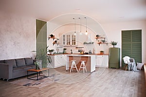 Modern open plan kitchen with living area and big window