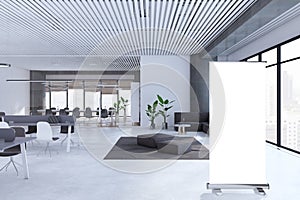 Modern open space designer office interior with empty white mock up banner, furniture, panoramic windows with city view, concrete