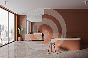 Modern orange bathroom interior with tub and sink, window and empty wall