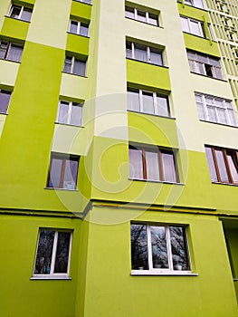 Modern panel apartment building with plastic windows and insulated walls
