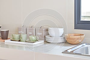 Modern pantry with white utensil in kitchen