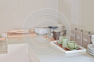 Modern pantry with white utensil in kitchen