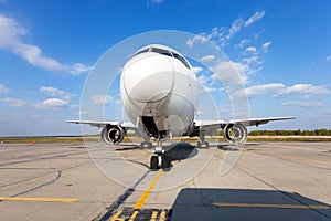 Modern passenger aircraft in the airport. Airplane without engines.