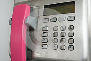 Modern payphone on the city street