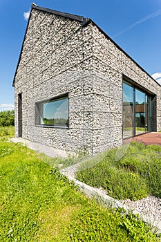 Modern pebble stone wall house