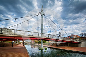 Modern pedestrian bridge over Carroll Creek, in Frederick, Maryl