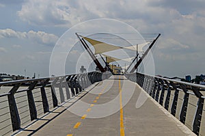 Modern pedestrian bridge over the river guayas.guayaquil ecuador photo