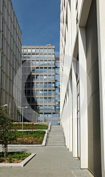 Modern pedestrianized urban landscape of tall commercial developments behind leeds beckett university