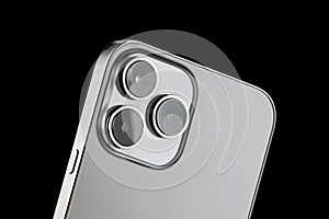 a modern phone with three cameras for photography and video shooting. close-up phone lenses from the back of the phone