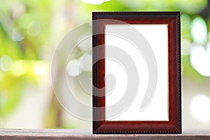 Modern Picture Frame placed on a wooden floor.