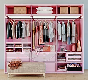 Modern pink wardrobe with clothes hanging on rail in walk in closet design interior