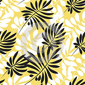 Modern plant pattern. Yellow and black tropical leaves