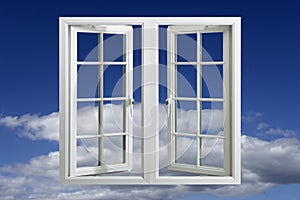 Modern plastic pvc window floating in blue sky