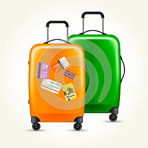 Modern plastic wheeled suitcases with travel tags