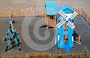 Modern playground with a decorative danish mill