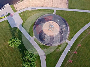 Modern playground on lake coast in park, aerial view