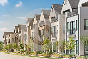 Modern porch of new development three story single family houses near Dallas, Texas