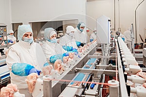 Modern poultry processing plant.Factory for the production of food from meat.Conveyor Belt Food.Automated production photo