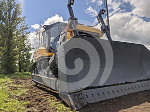 Modern powerful bulldozer. Heavy industry.