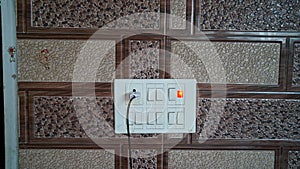 Modern preinstalled Electricity board in a wall. New technology based modern switch module.