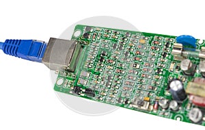 Modern printed-circuit board with electronic components on white