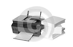 Modern printer and stack of paper on white background