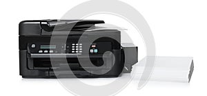 Modern printer and stack of paper on white background