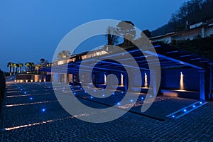 Modern private car park with illuminated roof, empty