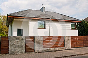 Modern private house with horizontal bars grey steel fence