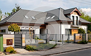 Modern private house with horizontal bars grey steel fence photo