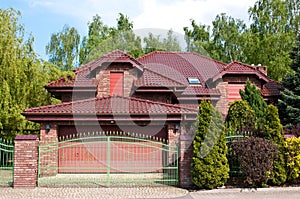 Modern private house with red brick and tile