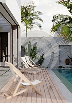 Modern private pool villa terrace with beach chairs, swimming pool and tropical outdoor plants