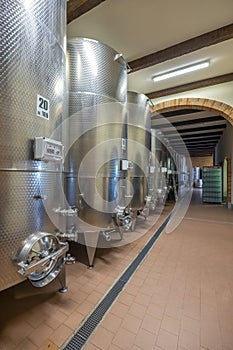 Modern production wine cellar with stainless steel tank, Canale, Piedmont, Italy