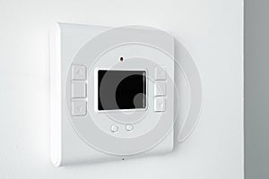 Modern programmable thermostat water heater boiler for setting the room temperature. Smart home.