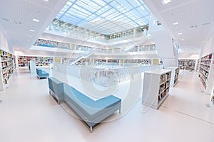 Modern Public City Library - STUTTGART, GERMANY - White interior with many white staircases. Beautiful mordern architecture