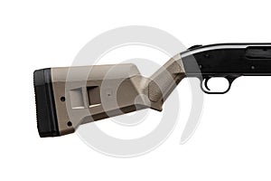 Modern pump-action shotgun with a plastic butt and fore-end isolate on a white back. Weapons for sports and self-defense. Armament