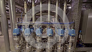 Modern pump installation inside brewhouse of brewery