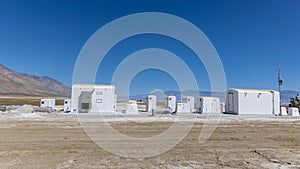 Modern pumping station at Owens lake in California against blue sky