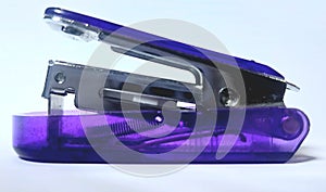 Modern Purple Glass Stapler for an Efficient Office with on paper white background