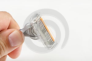 Modern Razor Blade With Three Razors In The Hand