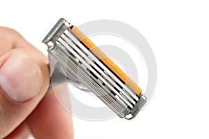 Modern Razor Blade With Three Razors In The Hand