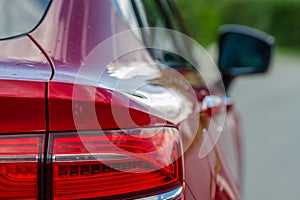 Modern rear light of a car. Brake light and arrow of large suv.