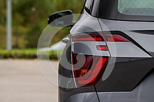 Modern rear light of a car. Brake light and arrow of large suv.