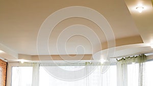 Modern recessed ceiling lighting setup in stylish kitchen interior